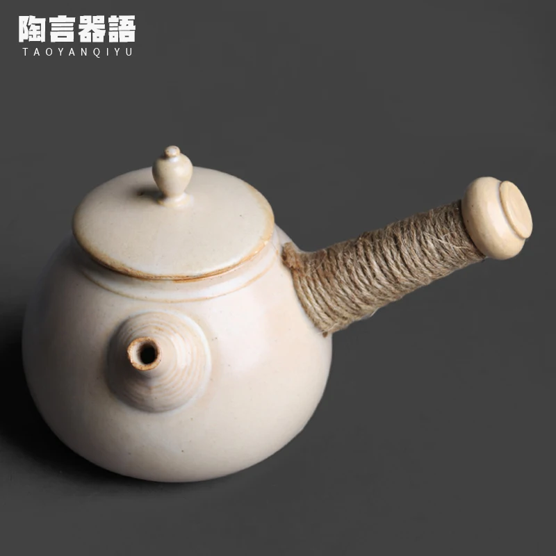 

Rough earthenware white glazed pot with side handle knob, electric or charcoal burner, ceramic teapot for boiling water for tea.