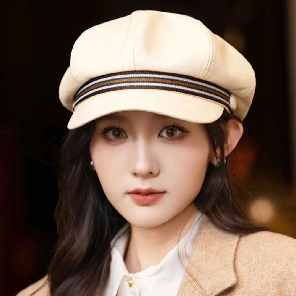 หมวกเบเร่ต์หนัง PU ลายทางลำลอง กันลม สไตล์อังกฤษ ทรงแปดเหลี่ยม หมวกสไตล์เกาหลีอบอุ่น หมวกจิตรกรสำหรับสุภาพสตรี