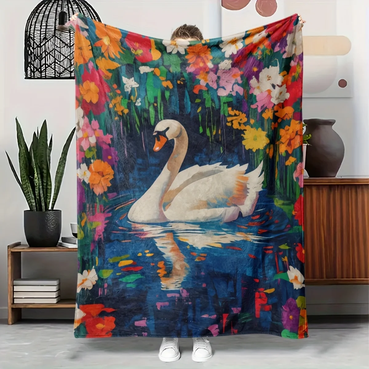 

A cozy swan and floral-themed flannel blanket - soft and warm, perfect for camping, sofas, beds, and chairs, a great holiday gif