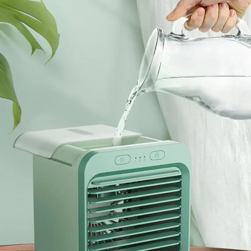 Desktop cooling fan Air cooler USB portable household humidification spray cooling mini electric fan