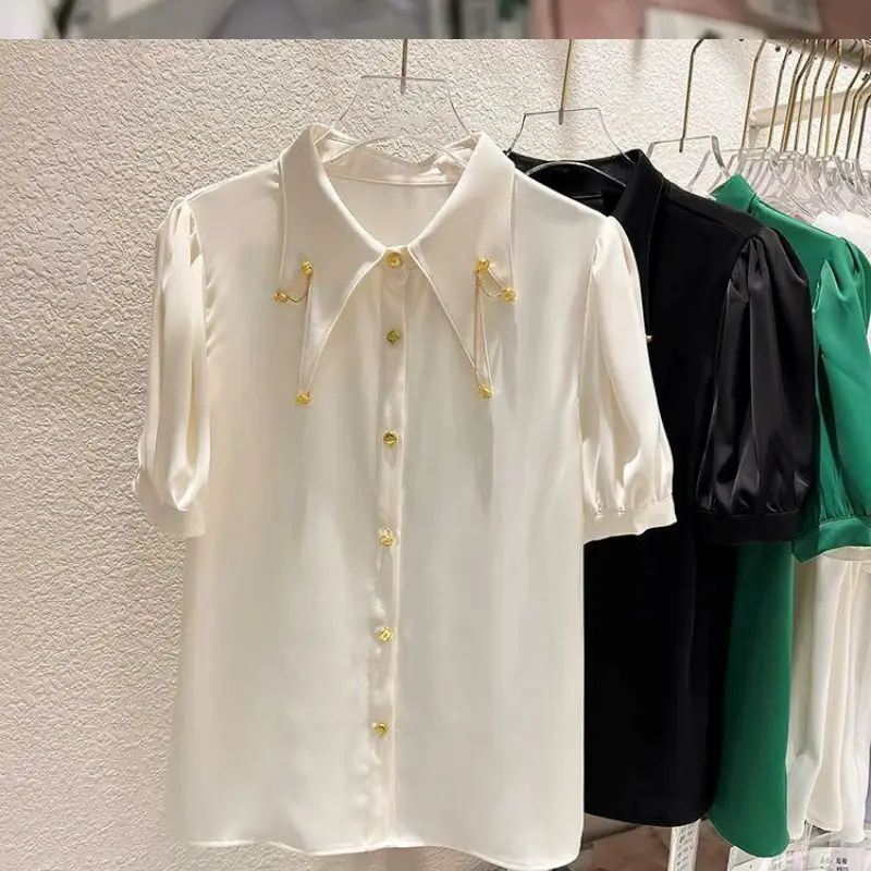 2023 New Summer Temperament Chain Solid Color Turn-down Collar Short Sleeve Blouse Women Clothing Simplicity Buttons Loose Tops