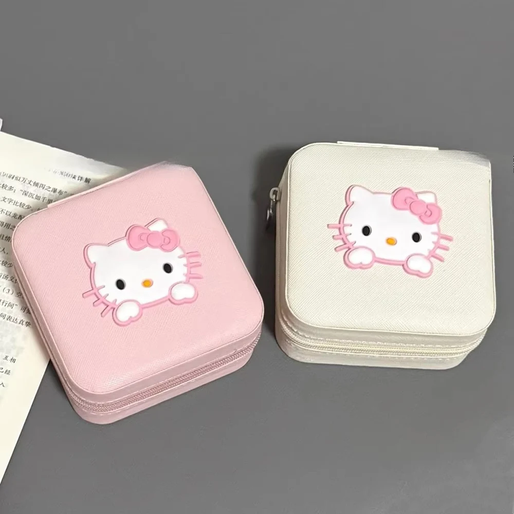 กล่องใส่เครื่องประดับแมวน่ารักสีชมพู Sanrio รุ่นใหม่ ขายดี พกพาสะดวก กล่องเก็บแหวน ต่างหู กล่องเก็บอุปกรณ์เสริมขนาดเล็กพกพาสำหรับเดินทาง