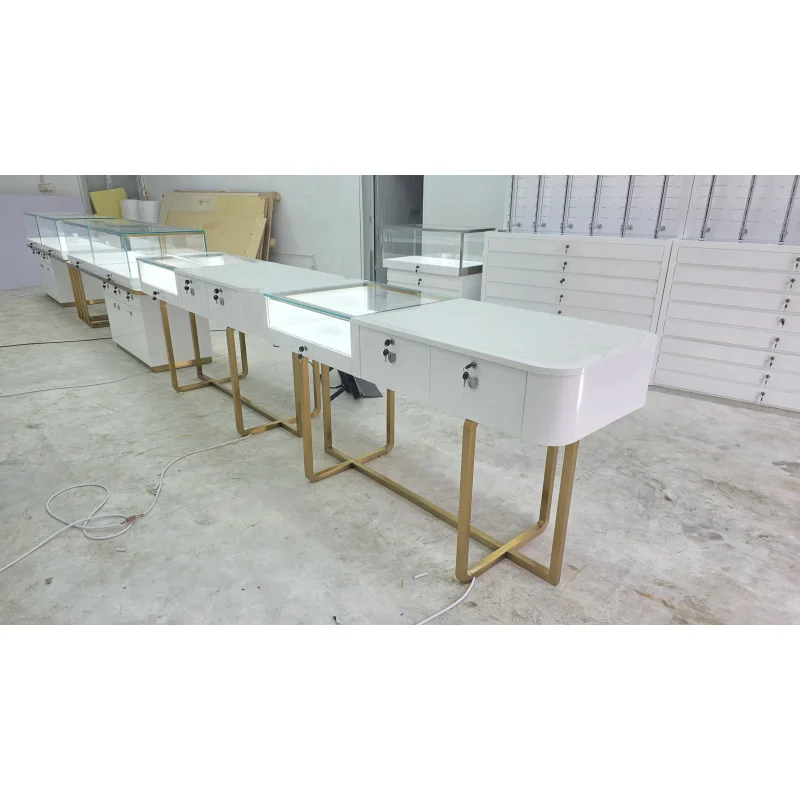 custom.Luxury Custom Design Jewelry Display Cabinet Painted Stainless Steel Tempered Glass LED Light Mirror Back Showcase