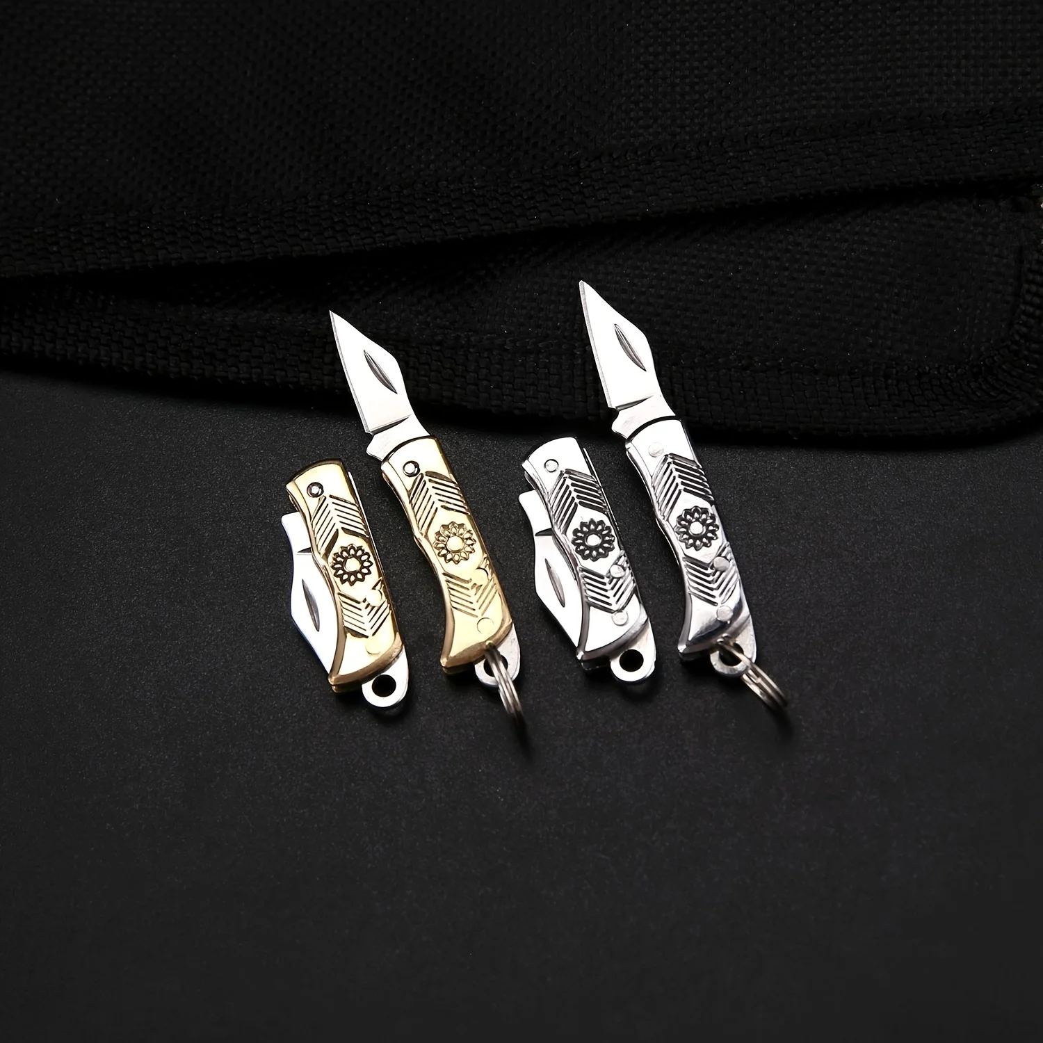 Portable compact folding pocket knife with stainless steel blade, keychain attachment, lightweight and durable
