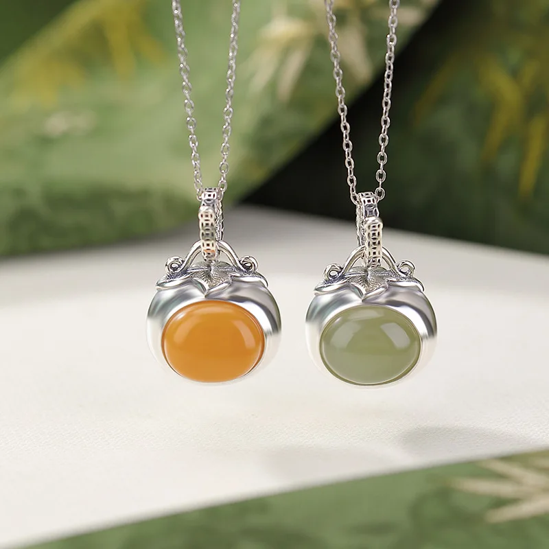 

Hetian S925 Sterling Jade Amber Persimmon Ruyi Money Bag Oval Silver Pendant