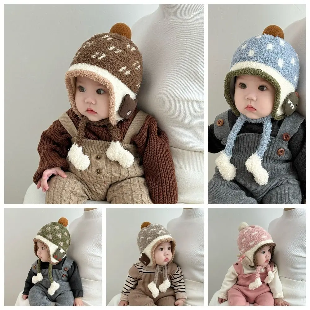 Precioso gorro con protección para los oídos para bebé a prueba de viento, gorro grueso de lana Coral para niños, gorro para mantener el calor con dibujos animados para niños pequeños al aire libre