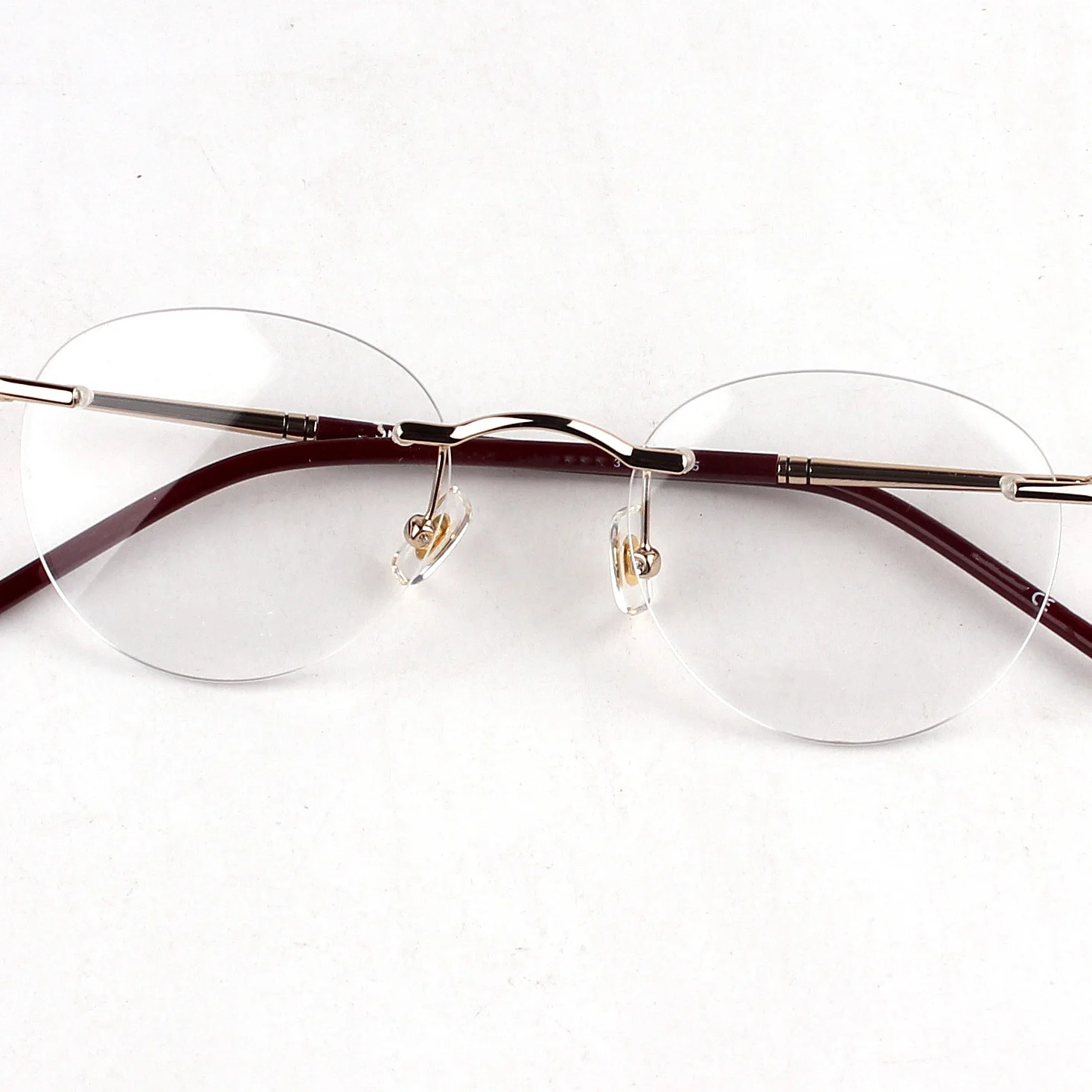 

0244 Luxury Brand Glasses Fashion Classic Frameless Shape Glasses Frame Optical Glasses Designer and Fashion Expert's Choice