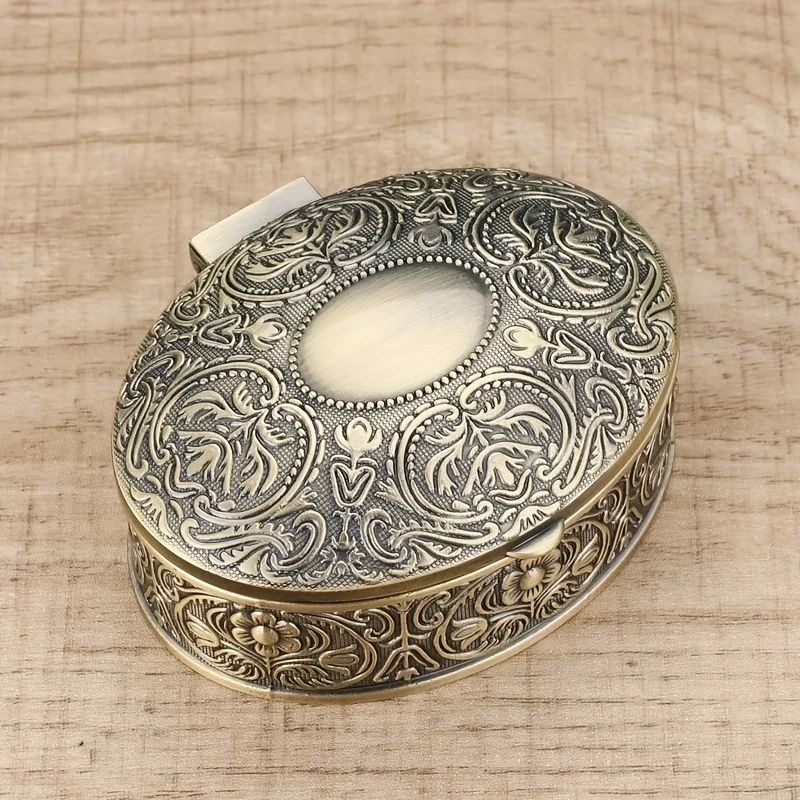 

Ancient Egyptian Inspired Oval Metal Jewelry Box for Keeping Necklaces Rings Watches and Nail Clippings