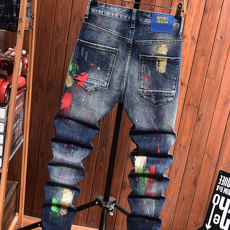Retro ripped jeans, men's fashion brand patch, inkjet scratch print, worn casual trend, Korean version long pants