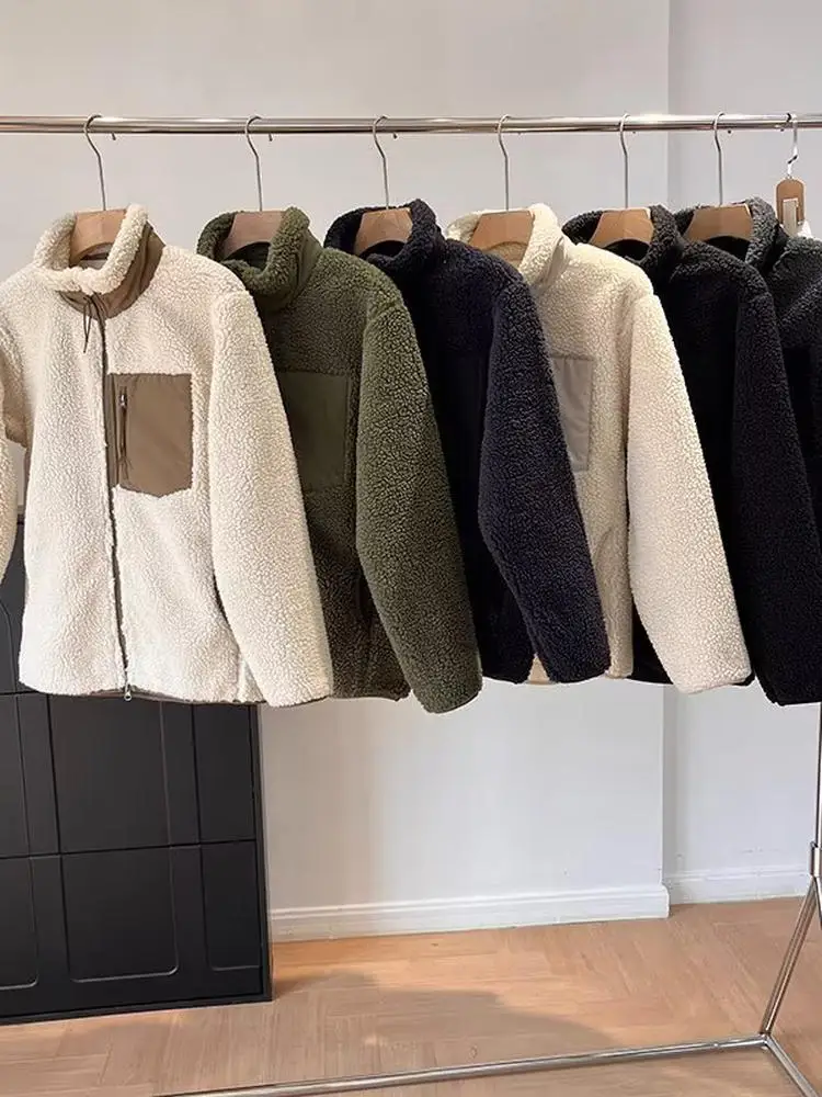 

Утепленная ветрозащитная куртка-жакет свободного кроя с прямым подолом и застежкой-молнией