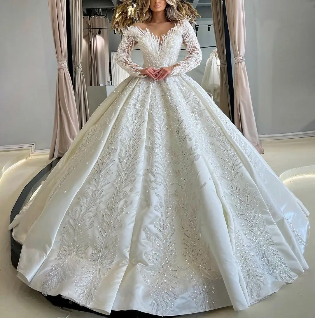 

Luxury Ball Gown Wedding Dresses Long Sleeves V Neck Sequins Appliques PearlsLace Ruffles Diamonds Bridal Gowns Vestina De Novia