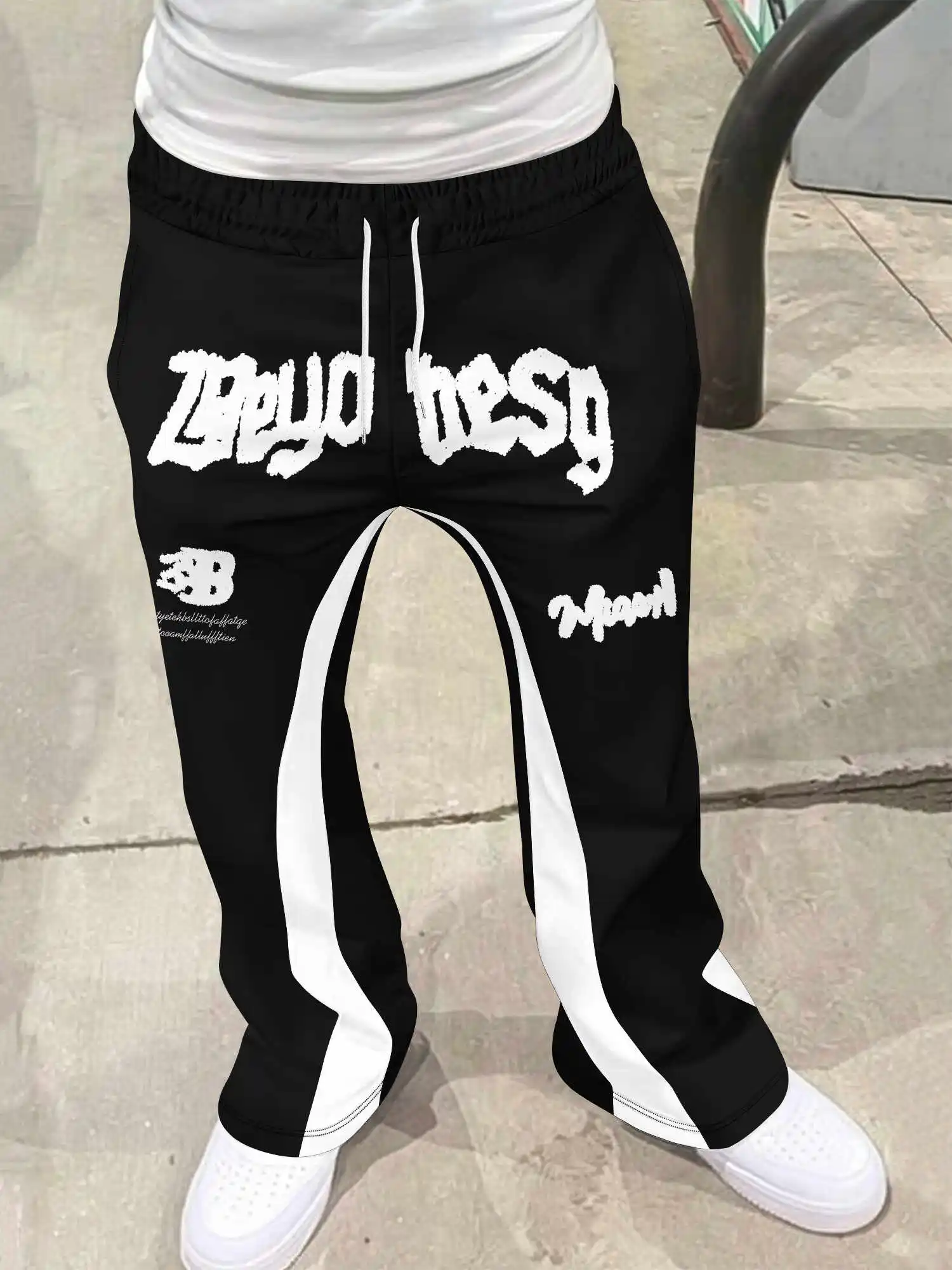 Y2K Gothic Schnelltrocknende Schlaghose Unisex mit Blitz-Schriftzug-Print Schwarz-Weiß Gestreift Gespleißte Hip-Hop Streetwear Lange Hose – Detail 5