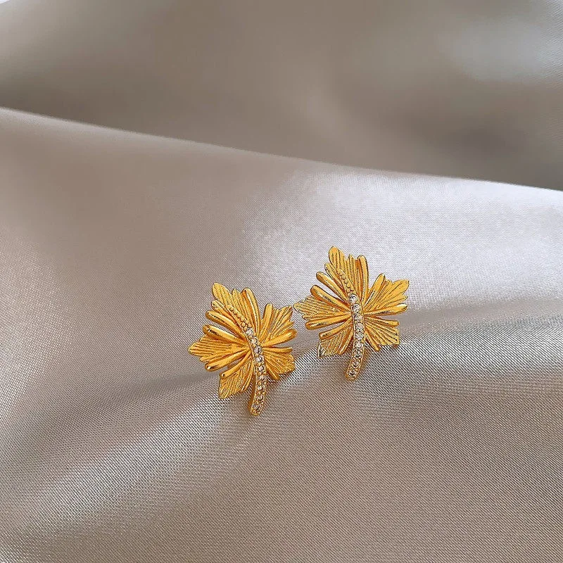 New model Subtle design sense Luxury with a touch of elegance Fashion Versatile Exquisite Gold color Maple leaves Alloy Earrings