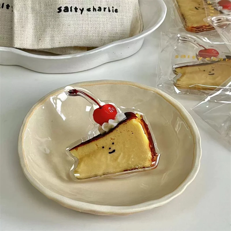 Suporte de telefone bolo basco fofo e delicioso adequado para acessórios iPhone 17 16 Pro