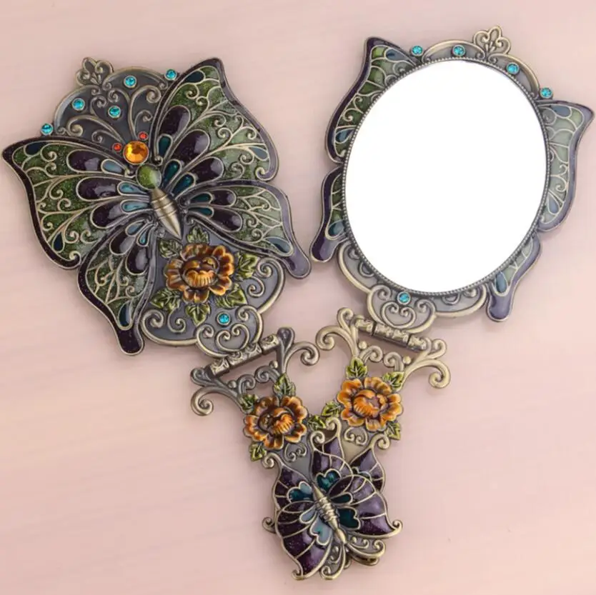 High quality desktop cosmetic princess lens portable handle can fold and hold a vintage peacock imitation copper mirror