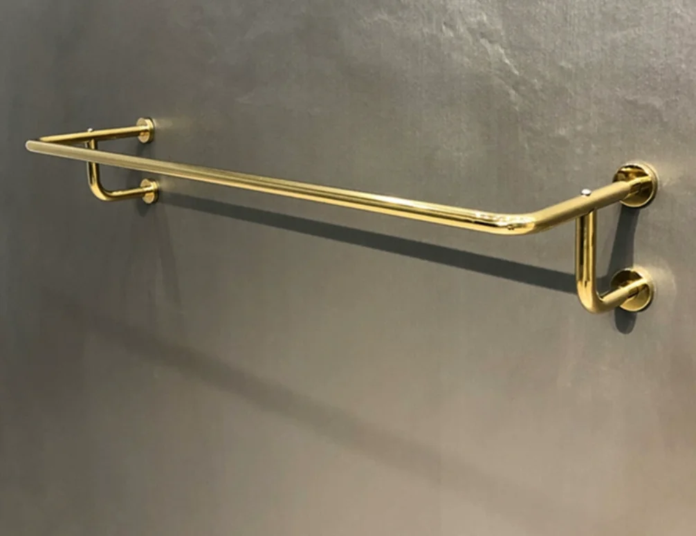 

Clothing store gold hanging shelf display rack wall mounted yellow titanium gold hanging hanger round tube hanging side rack