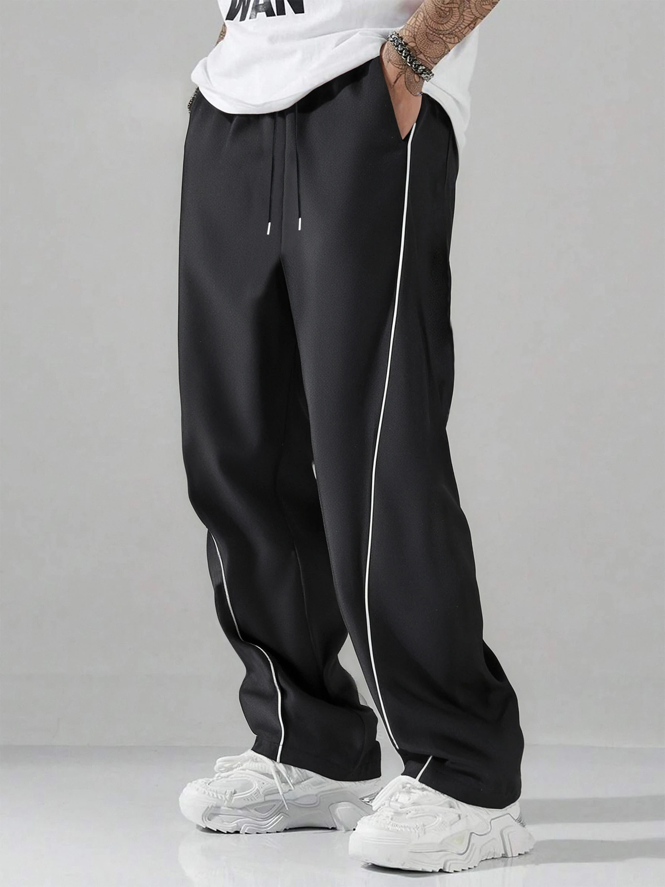 

Men's Autumn Knitted Casual Trousers, Long Pants with Slit Design, Loose Straight Leg, Simple and Versatile Style.