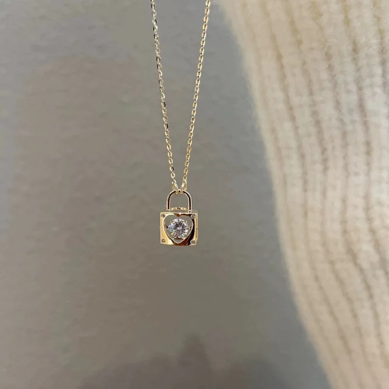 

14K gold plated pure silver pendant necklace with a cute heart lock; a luxurious and elegant necklace for women.