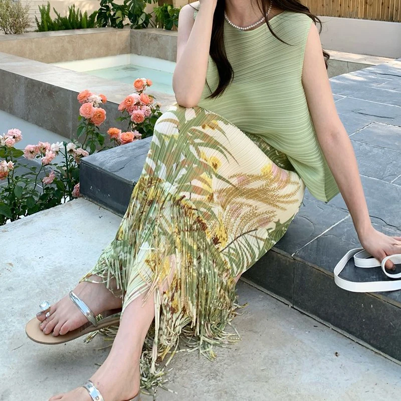 Sleeveless two-piece women's summer irregular round neck pleated loose sleeveless vest+high waist pleated tassel skirt suit