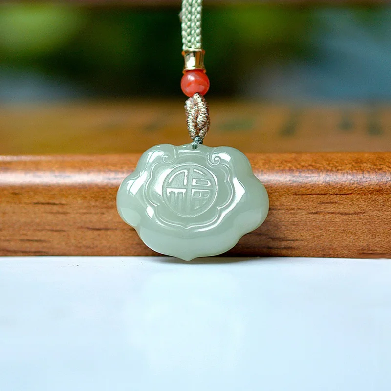 Exquisite Hetian jade Qinghai material Ruyi lock pendant, ethnic style, fashionable and versatile