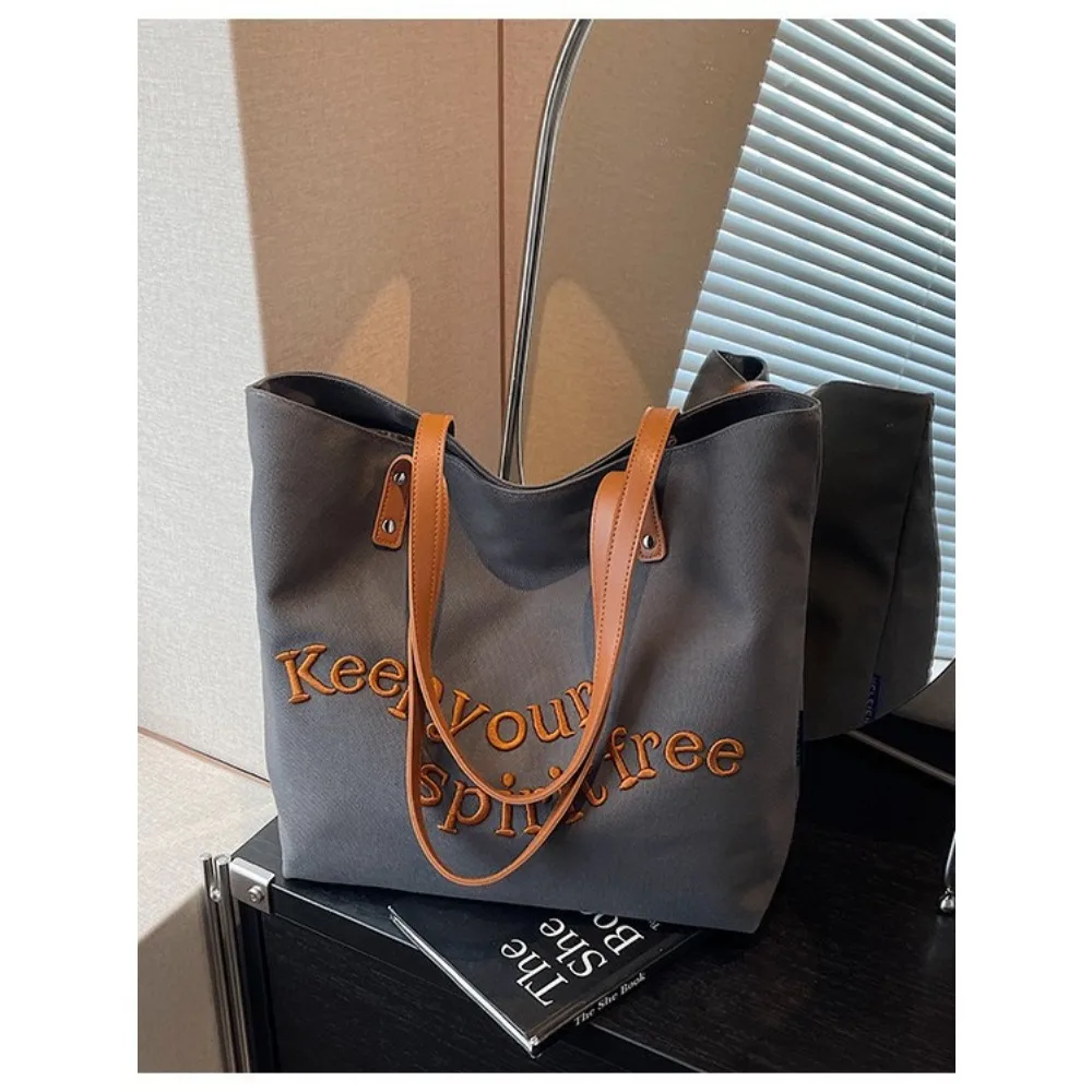 

Large-capacity wear-resistant canvas bag, men's single-shoulder bag, color-blocking hand-held crossbody tote bag