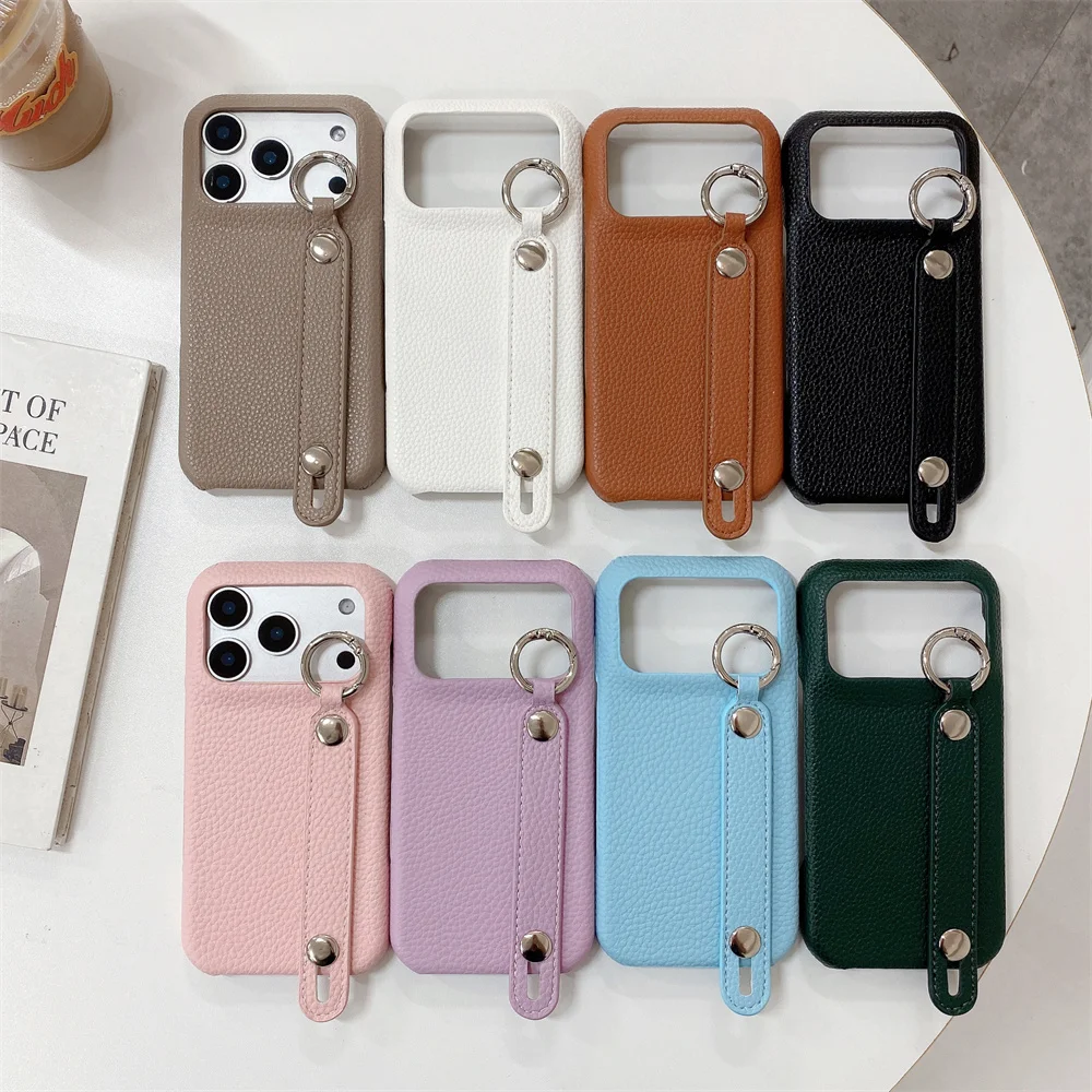

Luxury Leather Wristband Phone Case for Apple Cute Cover for iPhone 17 Pro Max 16 Pro 13 14 15 Funda With Stand protective cover