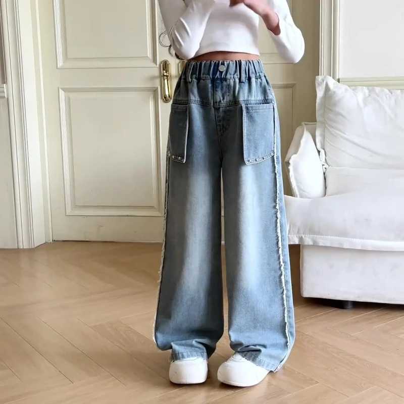 Girls' wide-leg jeans with fashionable pockets and unique side seams. Denim long pants for autumn, suitable for ages 7-14.