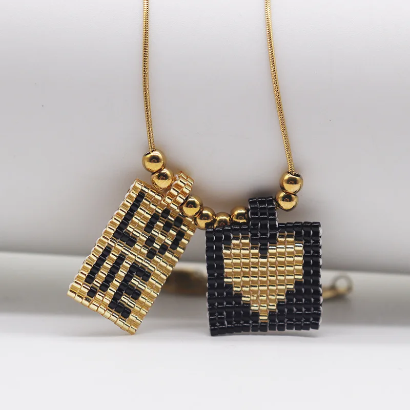 ZGMXR Rice bead necklace Originality Pendant Design Heart Hand knitting Cross Black Bohemia Adjustable Fashion  Beaded necklace