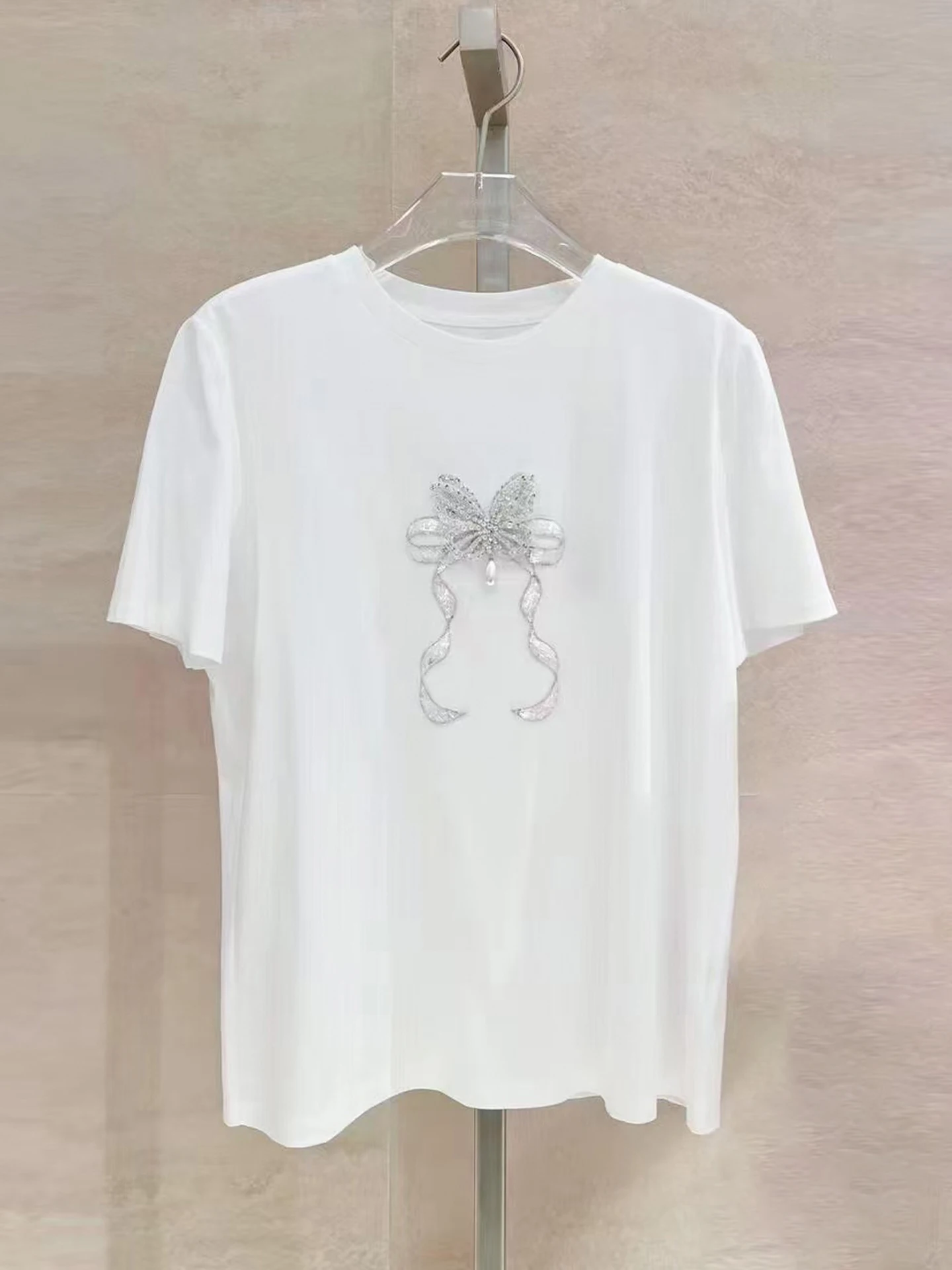

Sweet Loose Casual Women's T-irt with Knot And Diamond Embelliment Summer Collection from Nu Premium Brand