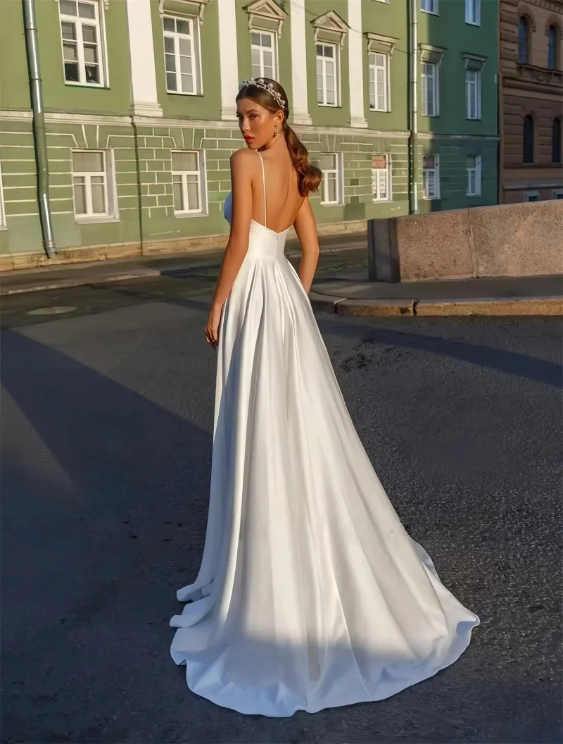 Stunning Satin A-line Wedding Dresses with Spaghetti Strap Gorgeous V-neck Bridal Gown with Sweep Train for Dreaming Wedding