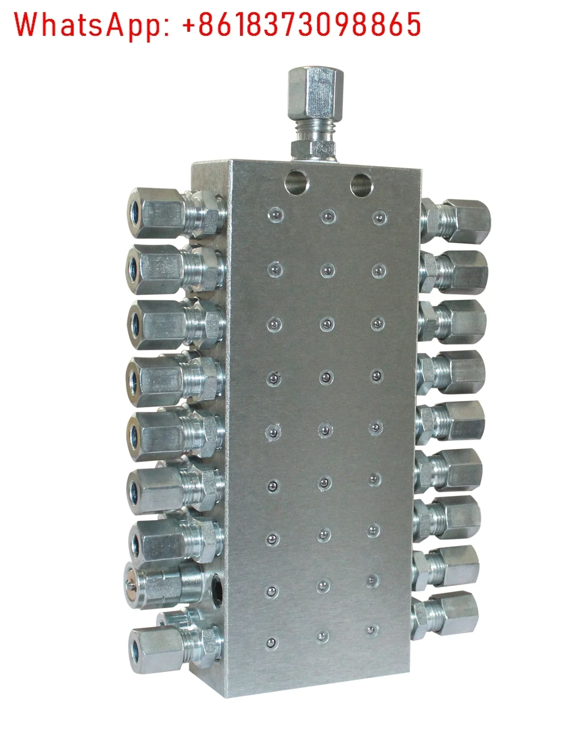 Progressive distributor JPQ-M. Oil distributor block. Distribution valve.