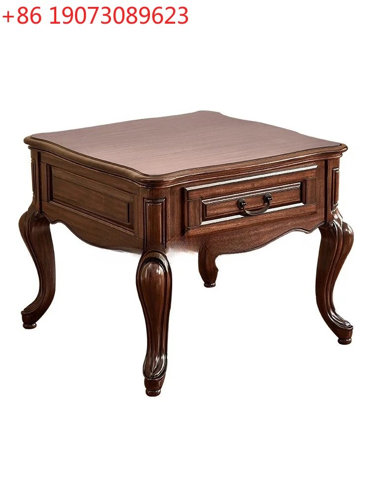 

Маленький журнальный столик из цельного дерева, черный