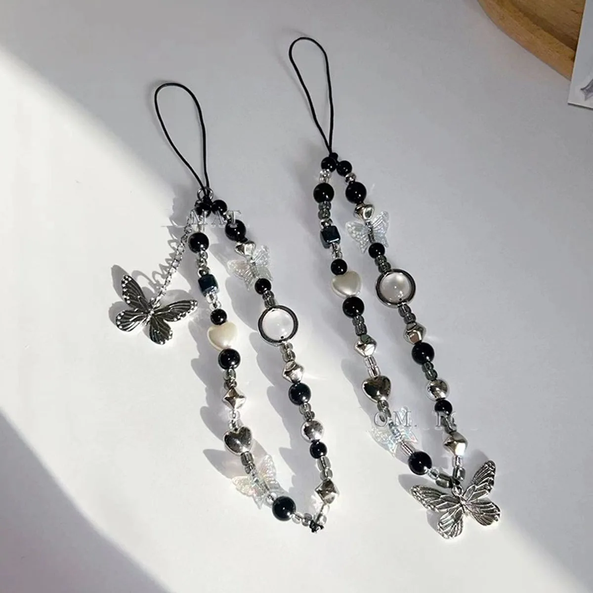 Chaîne de téléphone portable unique avec perles, motif papillon noir et blanc, style japonais et coréen, pour filles, avec caméra CCD intégrée