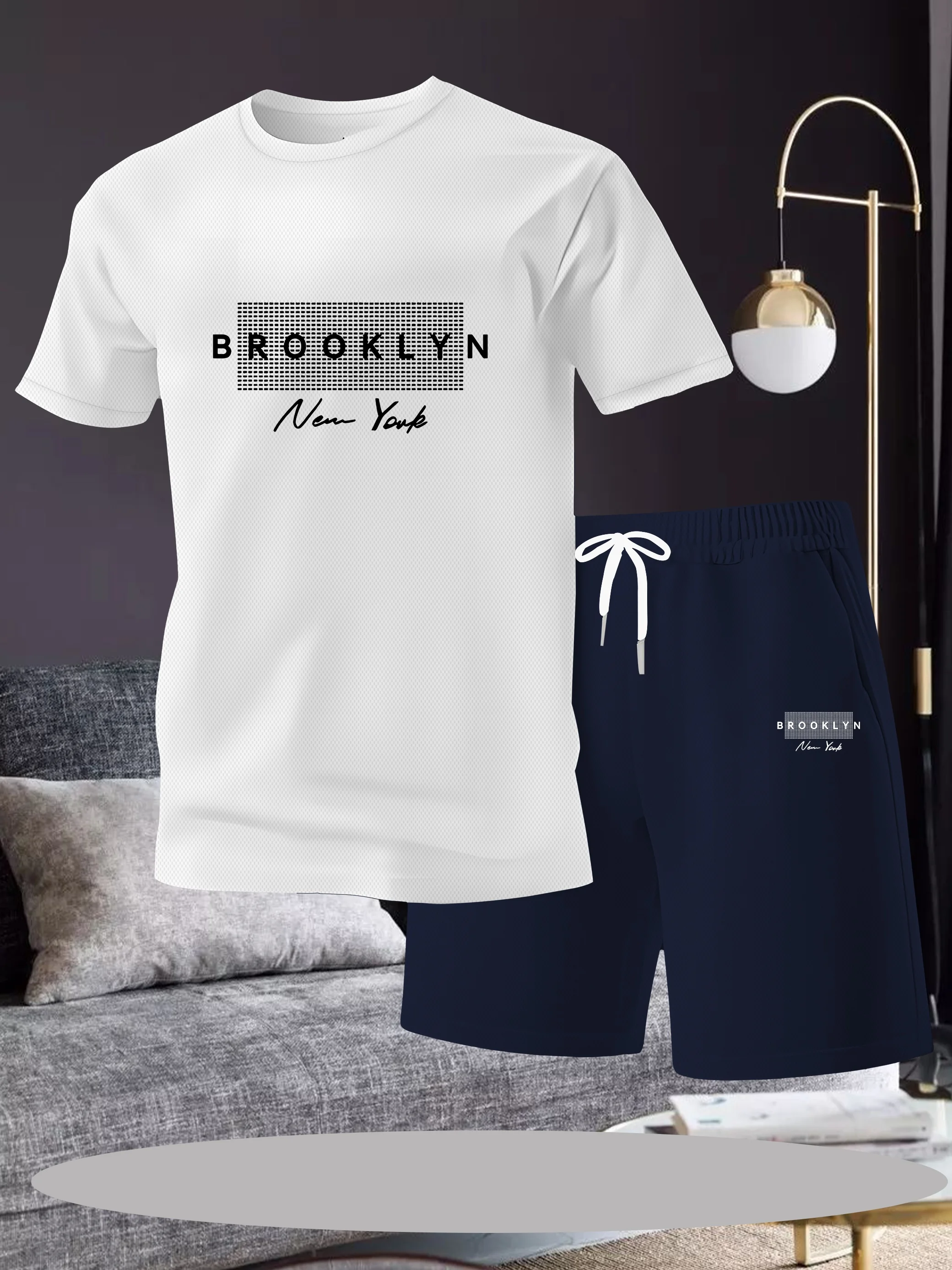 

Men's two-piece set, featuring a creative printed round neck short sleeved T-shirt and a pair of drawstring shorts, perfect for