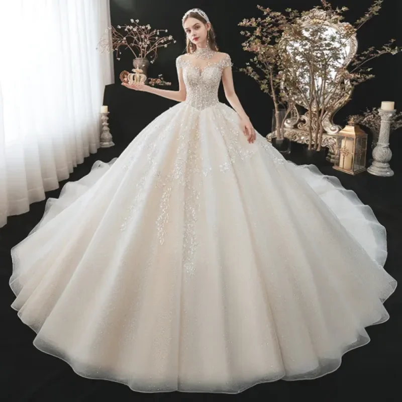 

Customized Wedding Dress For 2025 High Neck Short Sleeves Mesh Pearl Sequins Large Skirt Backless Straps Gorgeous And Dreamy