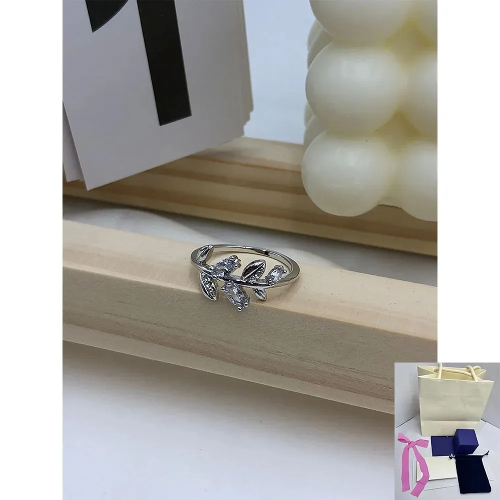 

New fashion hot selling white feather crystal creative design ring high-end romantic holiday gift