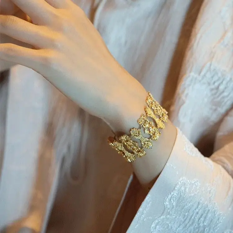 18k gold wide hollowed out design diamond bracelet