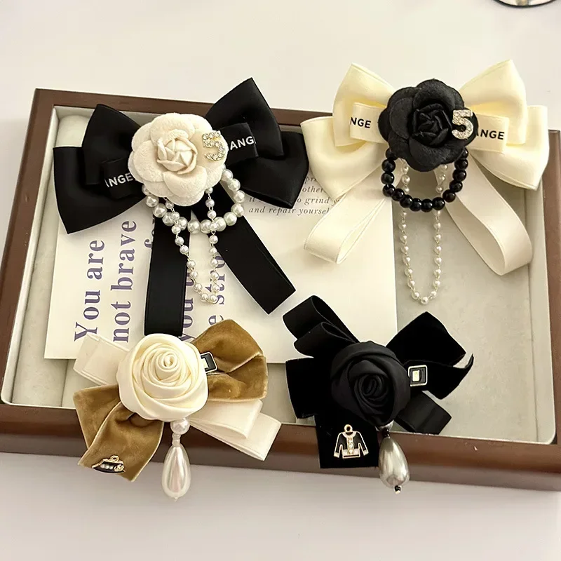 Trendy Korean Camellia Bow Tie Brooch Set: Crystal Pearls, Tassel Detail, Perfect Fashion Accessory for Women's Shirt Collars