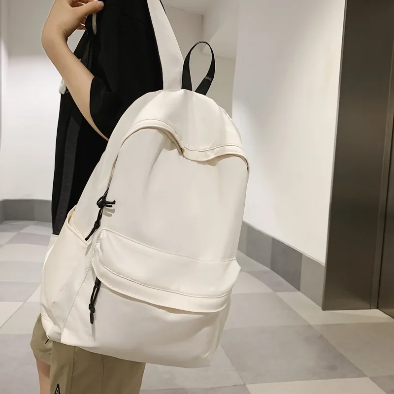 حقيبة ظهر عالية الجودة ذات سعة كبيرة بلون نقي حقيبة كتب مدرسية عالمية لطلاب الجامعات الابتدائية والثانوية