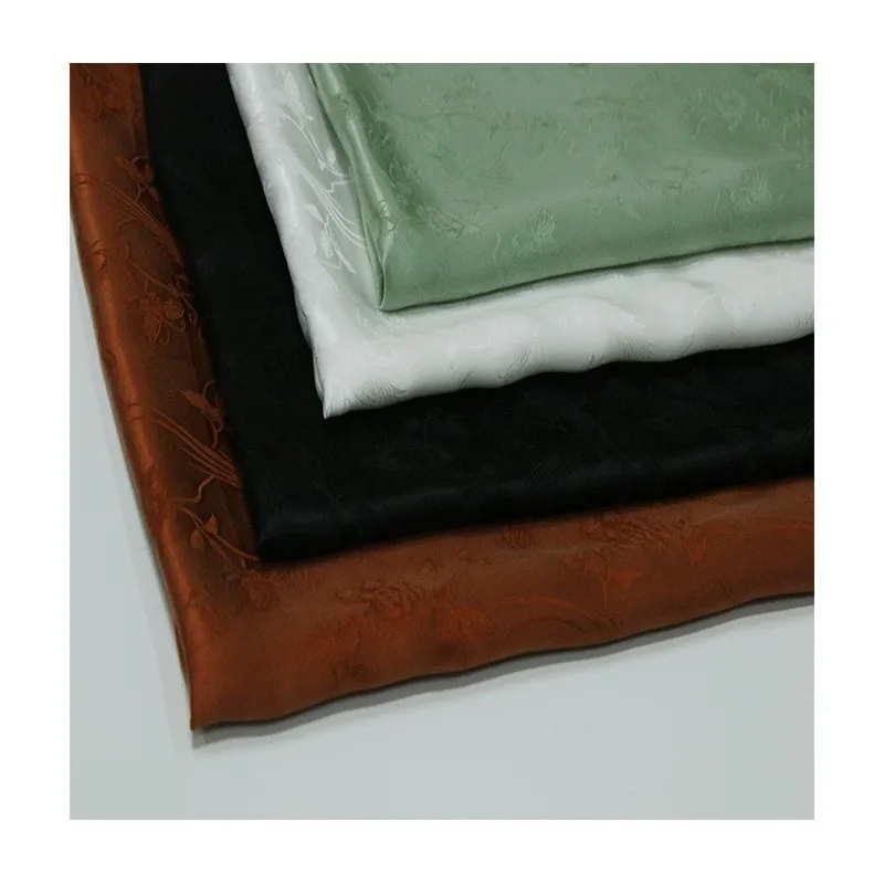 Three-dimensional embossed Chinese-style cheongsam made of silk jacquard satin fabric