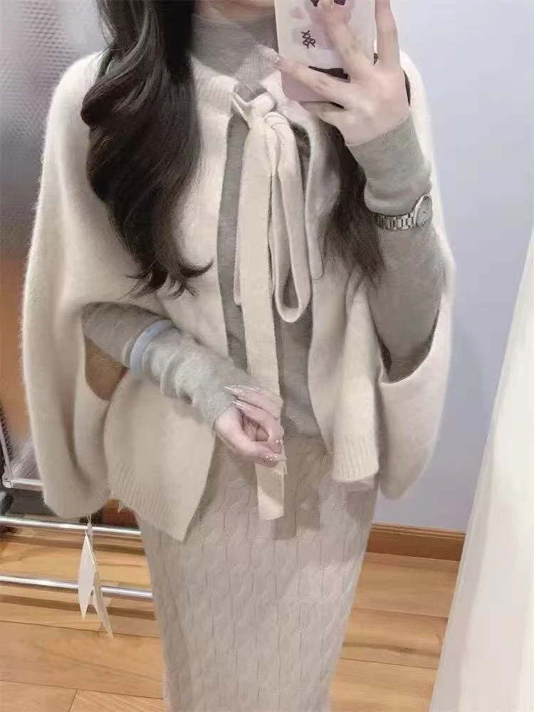 Scialle maglione coreano elegante tinta unita da donna dolce fiocco legato cardigan lavorato a maglia senza maniche moda maglieria esterna allentata