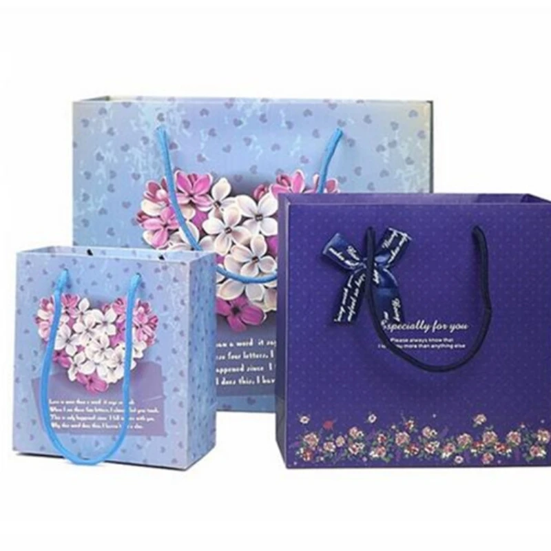 

Wholesale 100PCS/LOT Blue Series Flower Pattern Paper Bag/Paper Bag Birthday Wedding Party Gift Package Customized Logo