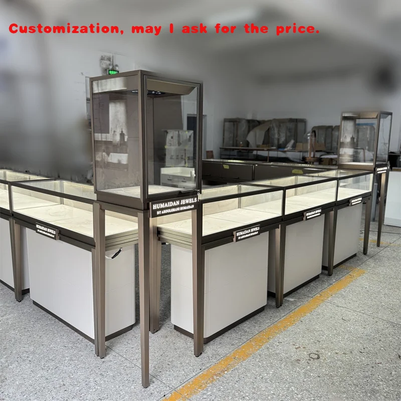 

custom.Luxury Metal Stainless Steel Jewelry Kiosk Interior Design Jewelry Display Cabinet Lockable Glass Jewelry Cases showcase