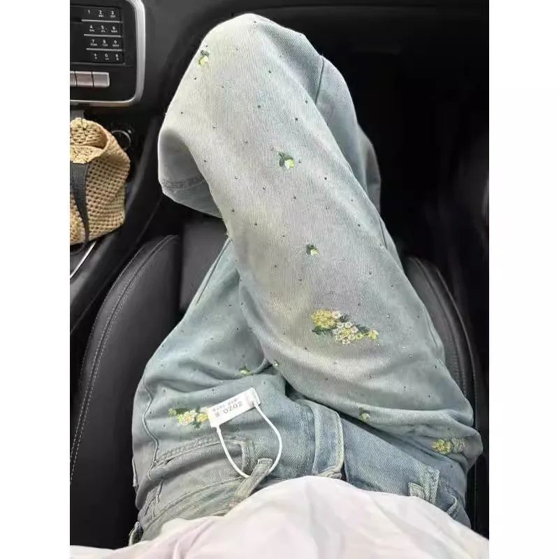 التطريز زهرة المرأة الجينز 2025 الخريف جديد الساخن فيكس عالية الخصر السراويل الزرقاء جيوب فضفاضة غير رسمية مستقيم واسعة الساق بنطلون