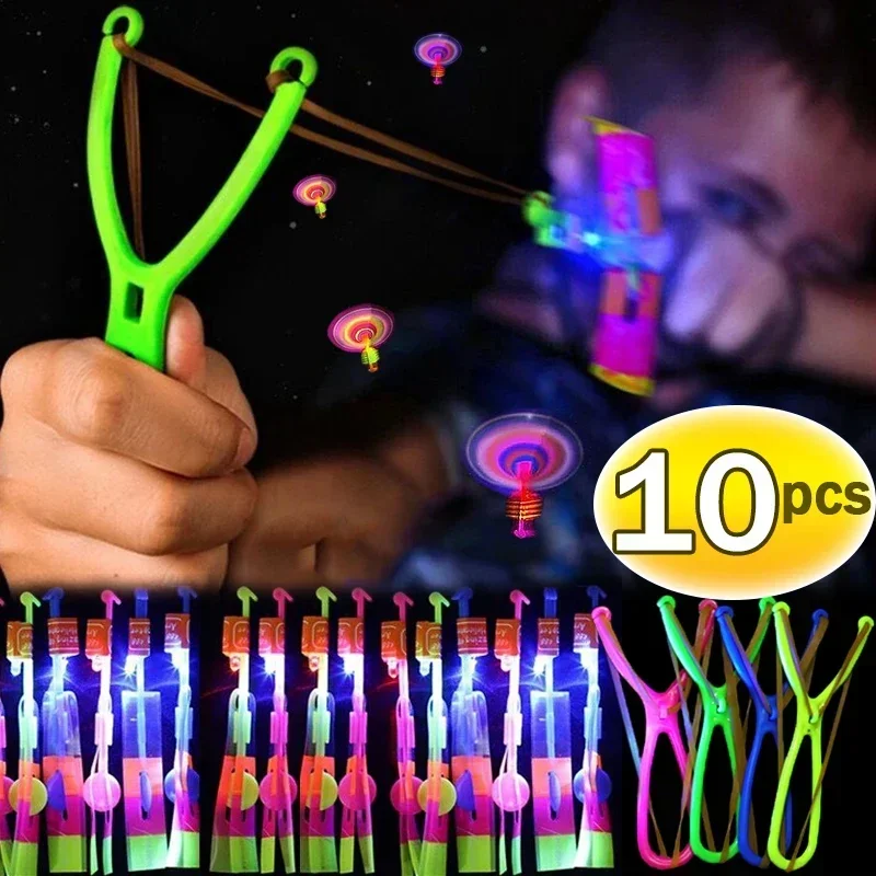 10Pcs Children's LED Rubber Band Rocket Toys Elastic Outdoor Luminous Flash Catapult Games Kids Lighting Up Arrow Party Props