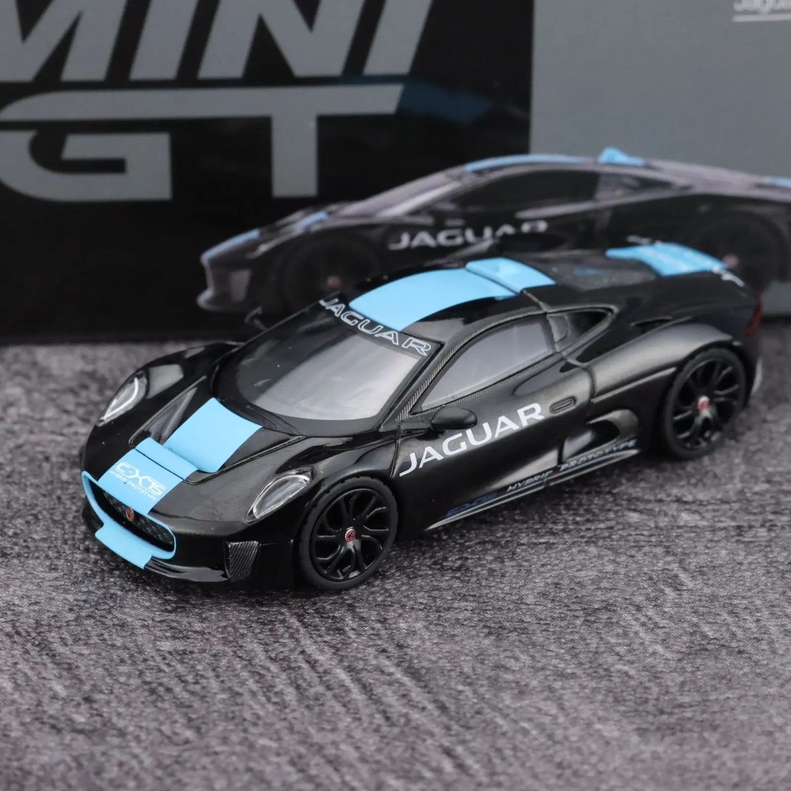 Diecast MINIGT Scala 1:64 Jaguar C-X75 Modello di auto in lega nera Giocattolo da collezione Regalo Souvenir Display Ornamento