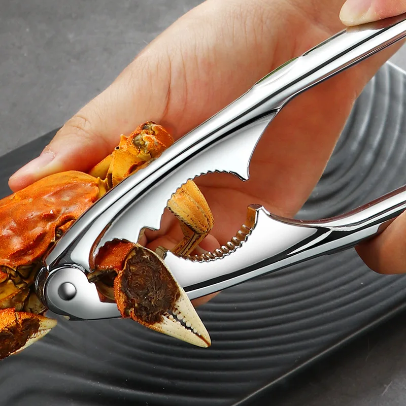 الصنوبر البقان البندق ذو طيات متعددة الوظائف سريعة الجوز المفرقع المقشر فتاحة الفولاذ المقاوم للصدأ كسارة البندق الجوز المفرقع