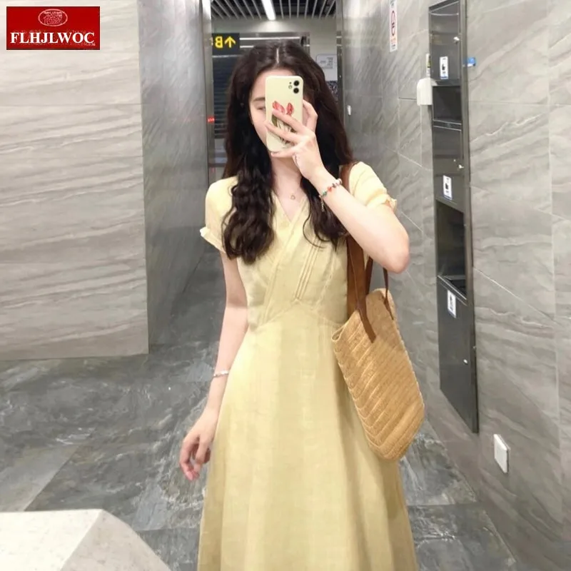 Abiti lunghi dal design francese Nuova moda estiva manica corta scollo a V pizzo giallo retrò vintage chic abito camicia di lino coreano