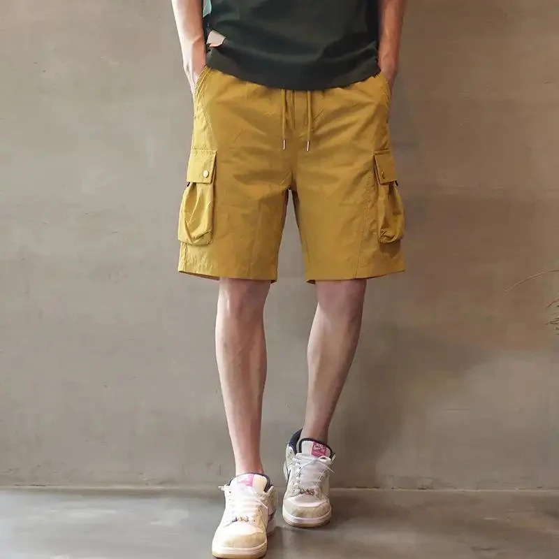 

American retro style multi-pocket work shorts for men, thin and loose knee-length casual shorts for summer, simple stylish long