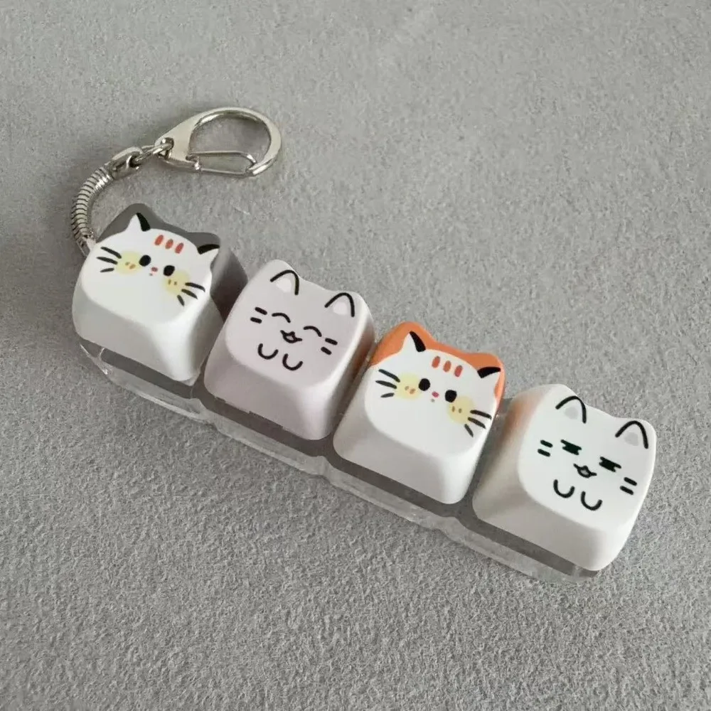 Porte-clés anti-stress chat à bouton-poussoir, 4 touches, style Kawaii, avec capuchons de touches créatifs et mignons, pendentif clavier pour doigt